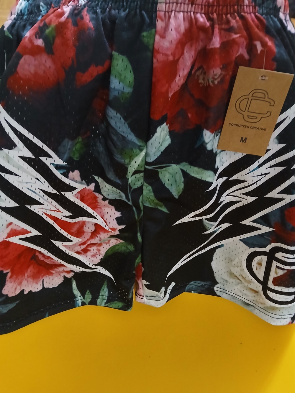 Men's Black Floral Athletic Shorts with Red & Green Accents -
